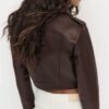 Bikerjacke aus Kunstleder mit Gürtel Bikerjacke aus Kunstleder mit Gürtel