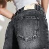 D75 Shorts aus zerrissenem Denim D75 Shorts aus zerrissenem Denim
