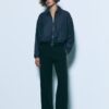 Fließende, elegante Hose mit geradem Bein und Gürtel