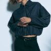 Fließende, elegante Hose mit geradem Bein und Gürtel