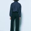 Fließende, elegante Hose mit geradem Bein und Gürtel