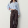 Fließende Hose mit Bügelfalte und Bindegürtel