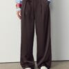 Fließende Hose mit Bügelfalte und Bindegürtel