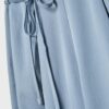 Fließende Hose mit Bügelfalte und Bindegürtel