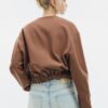 Jacke mit Puffärmeln und Rundhalsausschnitt Jacke mit Puffärmeln und Rundhalsausschnitt