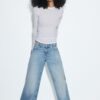 Jeans mit niedriger Leibhöhe und Wide Leg mit Stern-Detail