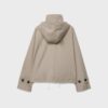Kurzes Trenchcoat mit Puffärmeln und abnehmbarer Kapuze Kurzes Trenchcoat mit Puffärmeln und abnehmbarer Kapuze