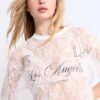 Oversize-T-Shirt aus Spitze mit grafischem Detail Oversize-T-Shirt aus Spitze mit grafischem Detail