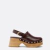 Plateau-Clogs mit Nieten