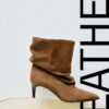 Slouchy Stiefeletten aus Leder mit Absatz