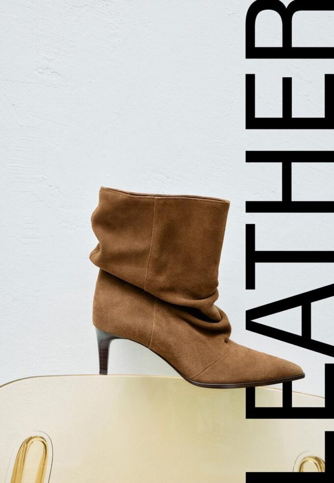 Slouchy Stiefeletten aus Leder mit Absatz