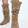 Stiefel mit Keilschuhen aus Leder