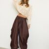 Strickpullover im Cape-Stil mit Schleife