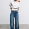 Strickpullover mit asymmetrischem, geripptem Saum