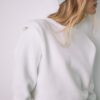 Strickpullover mit gepolsterten Schultern Strickpullover mit gepolsterten Schultern