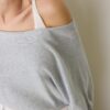 Strickpullover mit U-Boot-Ausschnitt und Überlagerung